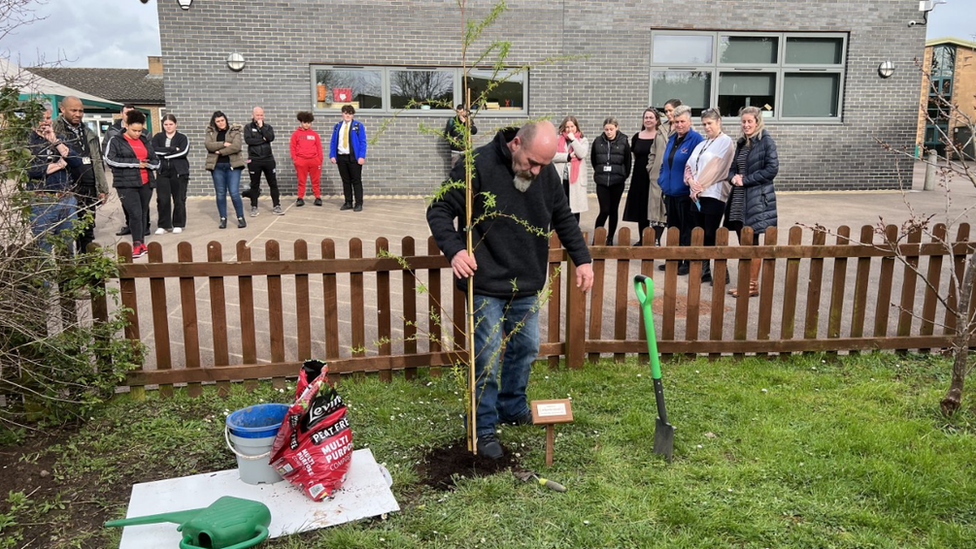 Ramarni Crosby's grandad plants tree