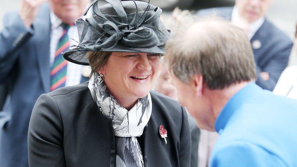 First Minister Arlene Foster greets Dean John Mann before the service