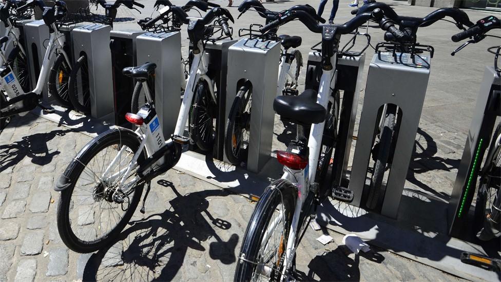 Electric bikes in a rack in Madrid