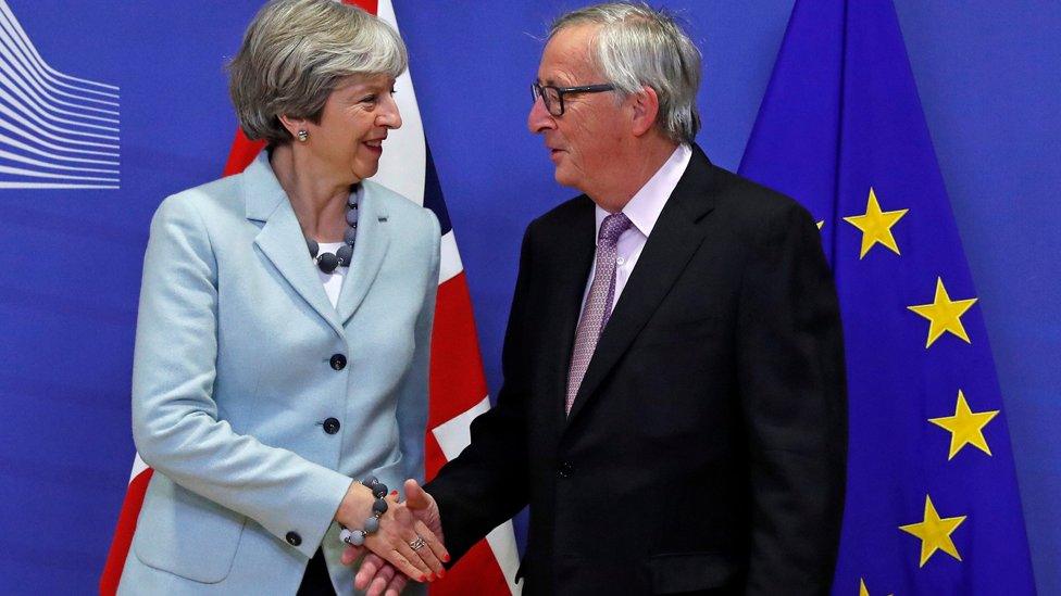 Theresa May and European Commission President Jean-Claude Juncker