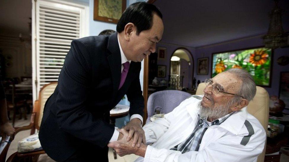 Cuba's former leader Fidel Castro, right, shakes hands with Vietnamese President Tran Dai Quang, left, in Havana, Cuba, Tuesday, Nov. 15, 2016.