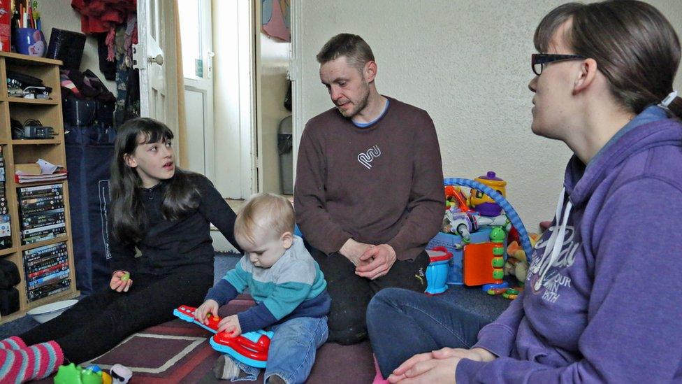 Dan, Hayley and family in their living room