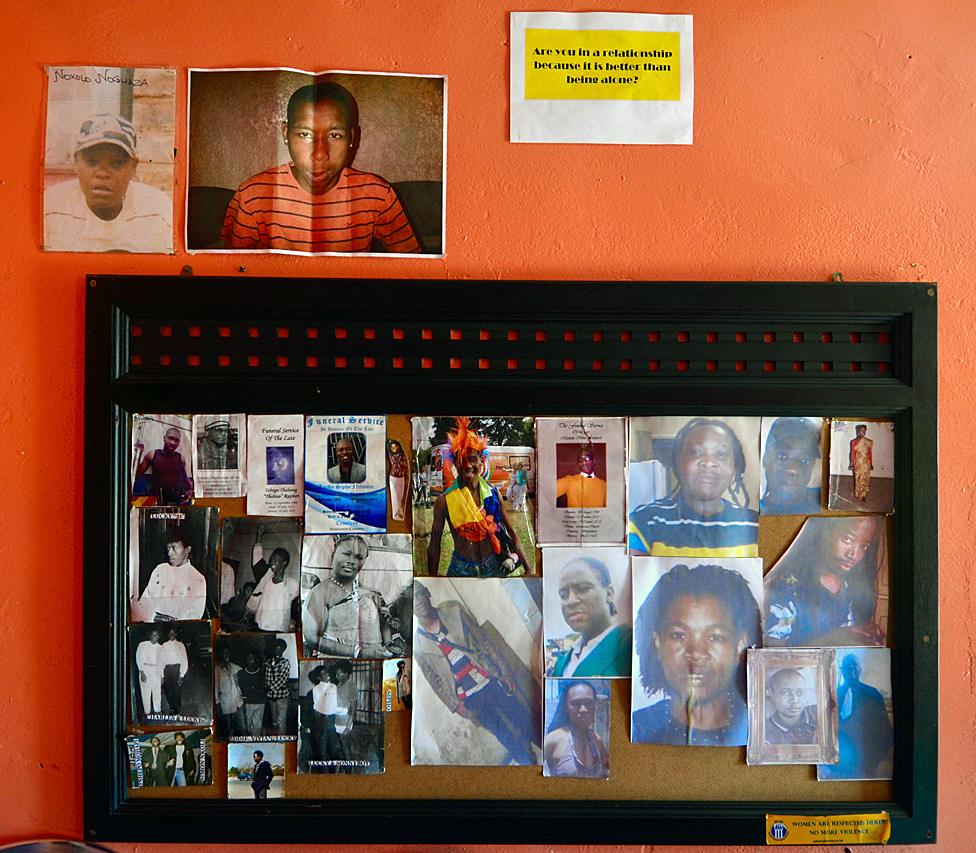 Remembrance wall containing photos of activists