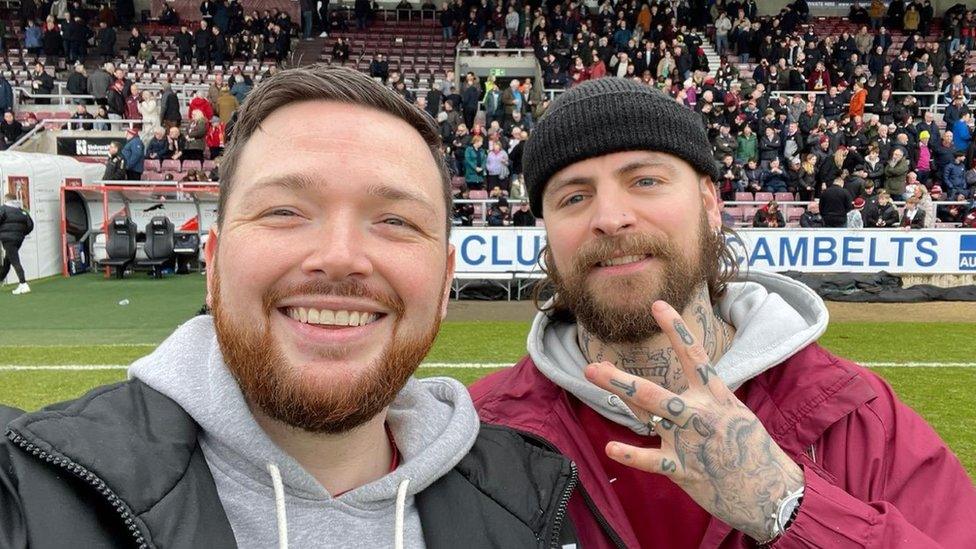 Northampton Town supporter Brendan Walsh and a friend at Sixfields Stadium