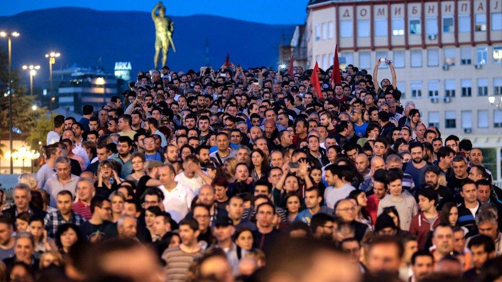 Protesters walk and shout the slogans during the protest against Macedonian President Gjorge Ivanov"s decision on wiretapping amnesty, in Skopje