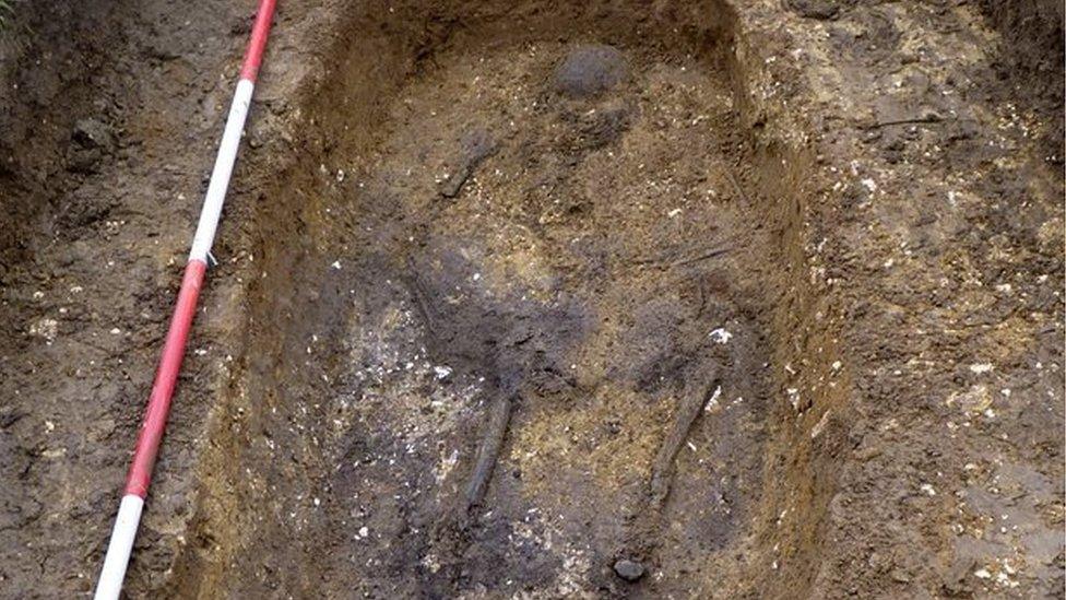 Skeleton at archaeological dig where pendant was found