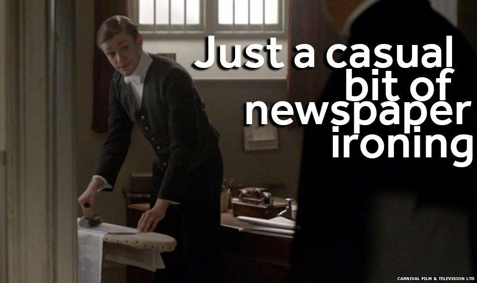 A servant ironing a newspaper