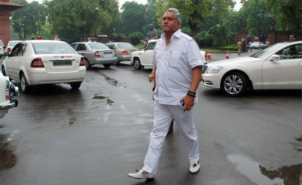 This file photograph taken on August 7, 2013 shows Vijay Mallya, Member of Parliament and then Chairman of the United Breweries Group, as he arrives at Parliament House in New Delhi. India"s foreign ministry said April 28, 2016