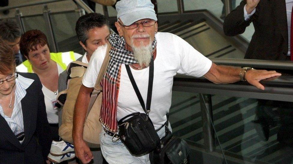 Gary Glitter arrives at Heathrow Airport in 2008