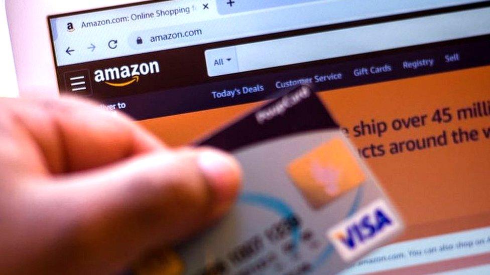 Visa card and Amazon website