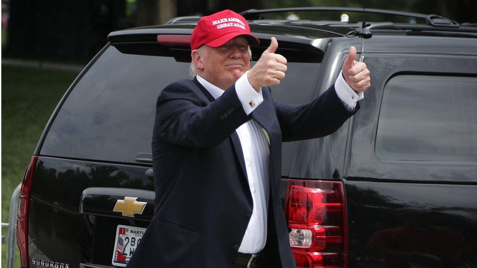 Donald Trump holds his thumbs up as he leaves after he spoke during the annual Rolling Thunder First Amendment Demonstration Run in Washington, DC.