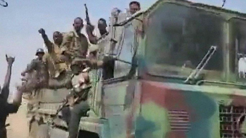 Gunmen in a truck