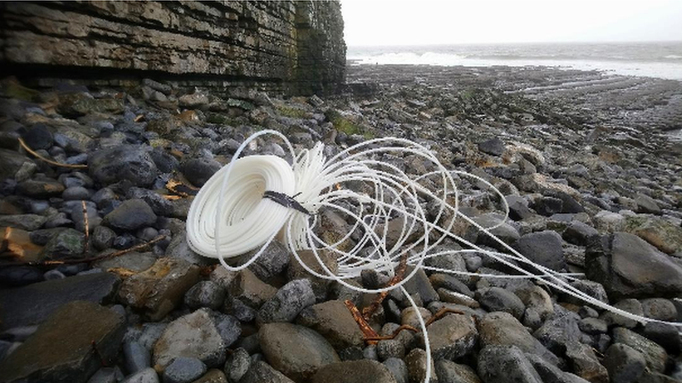 Plastic coil on a beach