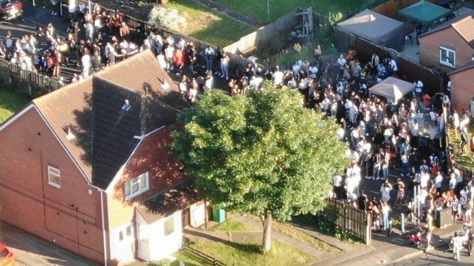 Crowds gather