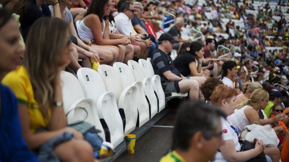 Spectators and empty seats at the beach volleyball venue in Copacabana beach during the 2016 Rio Olympics