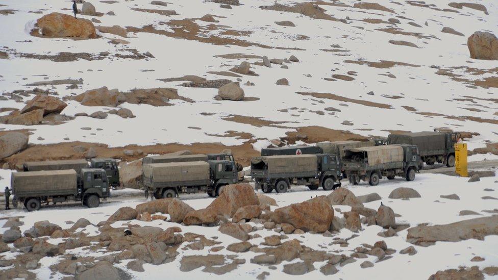 A convoy of Indian trucks