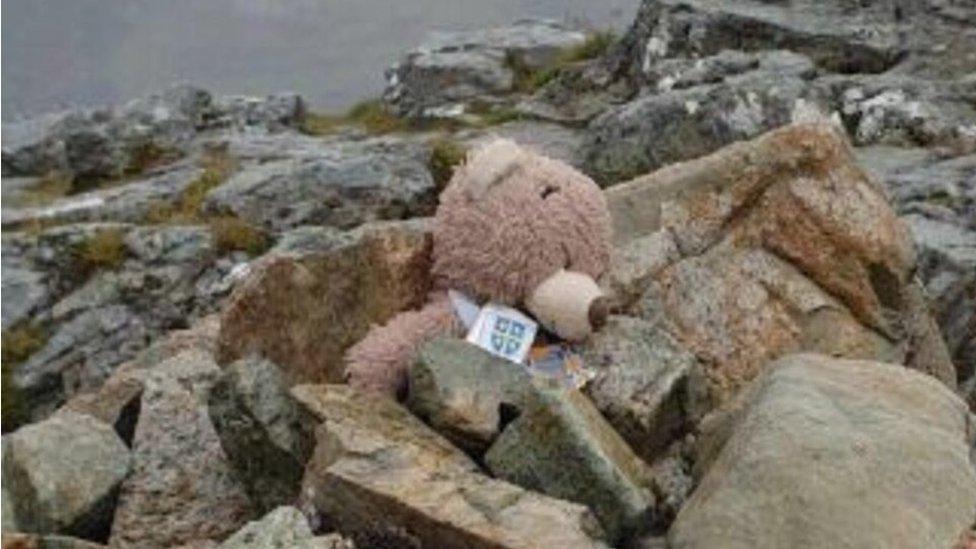 teddy bear after he was found on glencoe peak