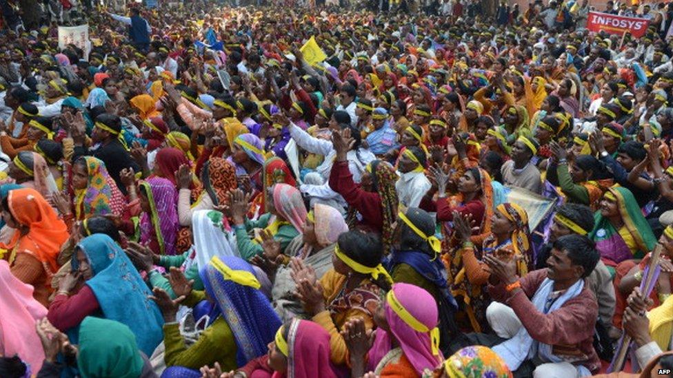 Indian women from the 'dalit' or 'lower caste' shout slogans during a Dalit Dignity Rally against Congress-led UPA government near Parliament House in New Delhi on December 6, 2013. Hu