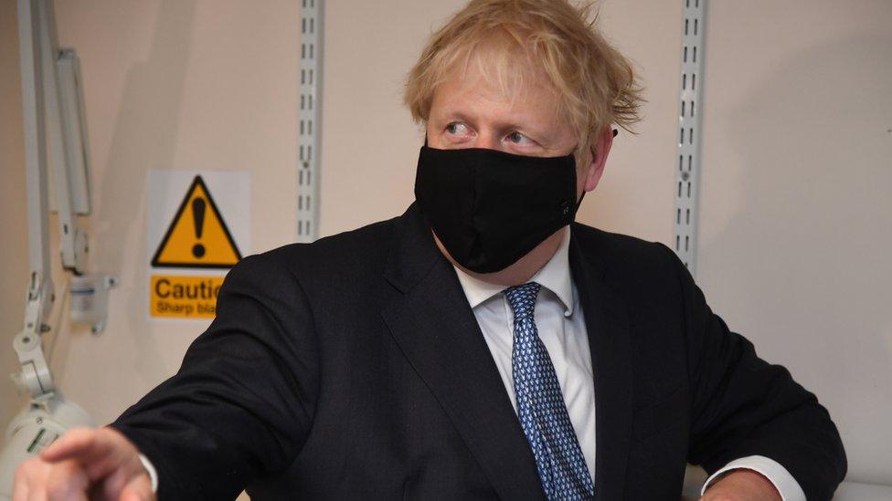 boris-johnson-wearing-a-face-mask-in-a-hospital