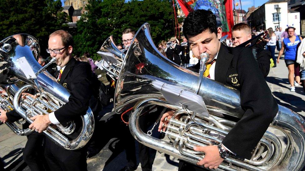 Chaps play musical instruments