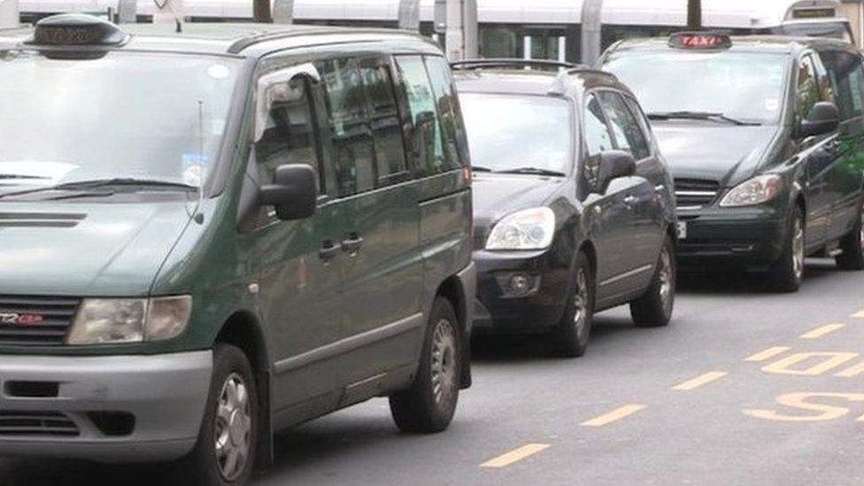 Taxi drivers queuing