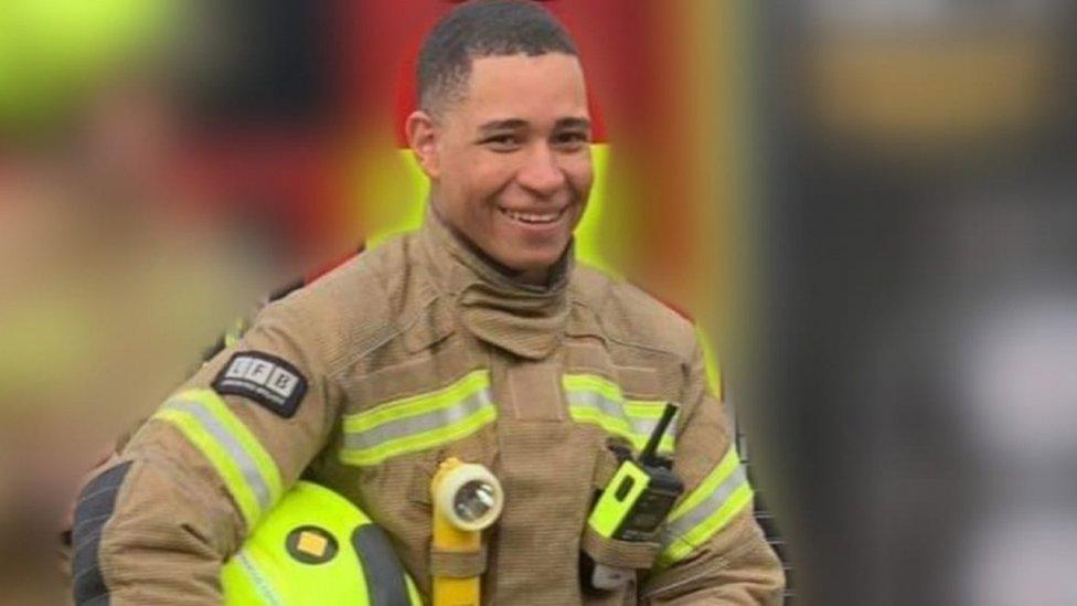 Jaden Francois-Esprit wearing his LFB uniform and smiling