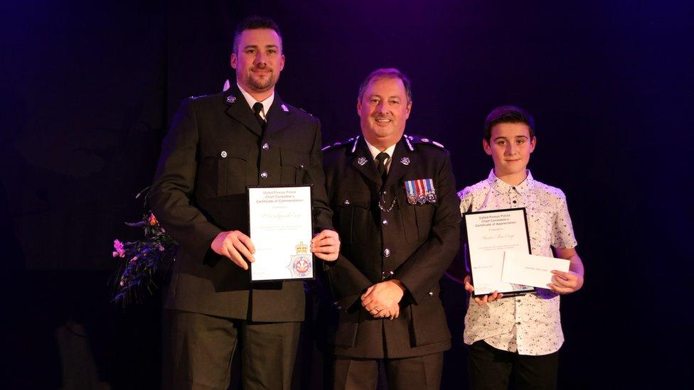 The Chief Constable - Heddlu Dyfed Powys Police with Sergeant Gareth Earp and his son Theo