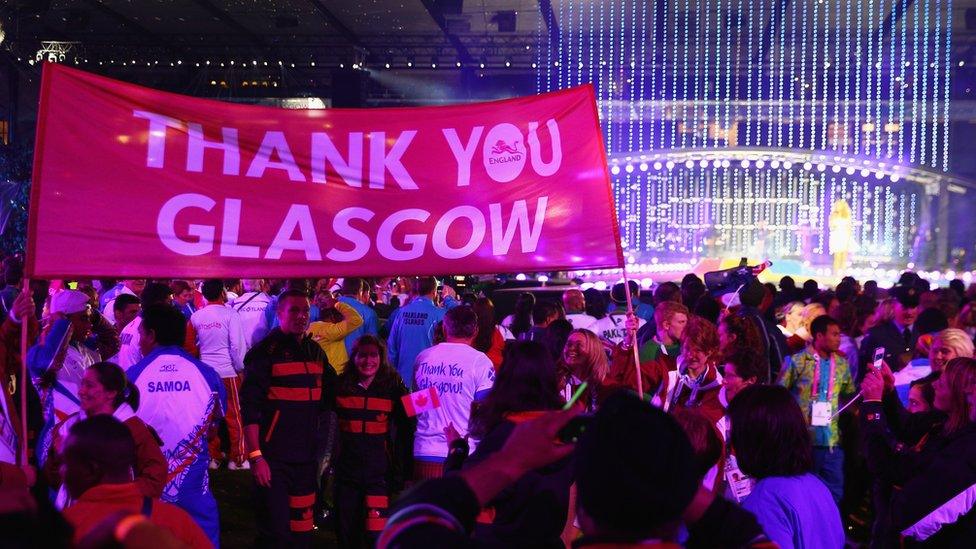 Red banner reading 'Thank you Glasgow' held aloft at the closing ceremony of the 2014 Commonwealth Games