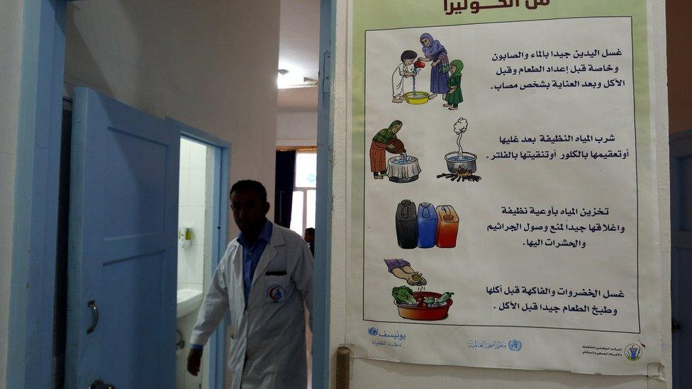 A Yemeni doctor inspects children suspected of being infected with cholera at a hospital in Sanaa, Yemen (15 January 2017)