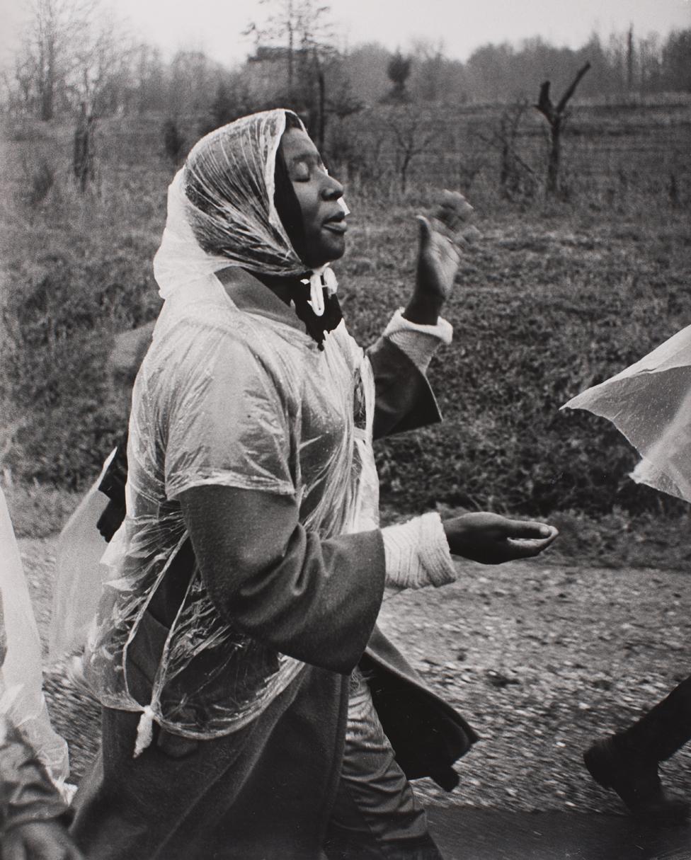 Woman singing on one of the Selma to Montgomery marches