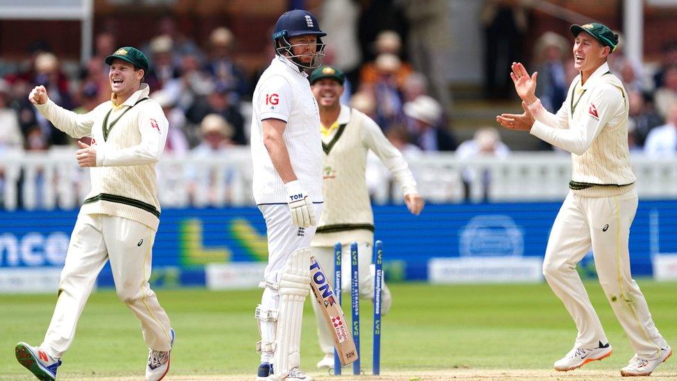 England's Jonny Bairstow (centre) looks frustrated after being run out by Australia's Alex Carey (not pictured) as players celebrate during day five of the second Ashes test match at Lord's, London.