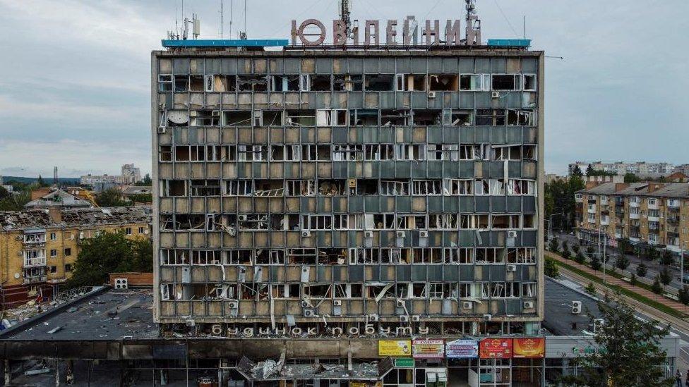 Eight-storey municipal building with windows blown out