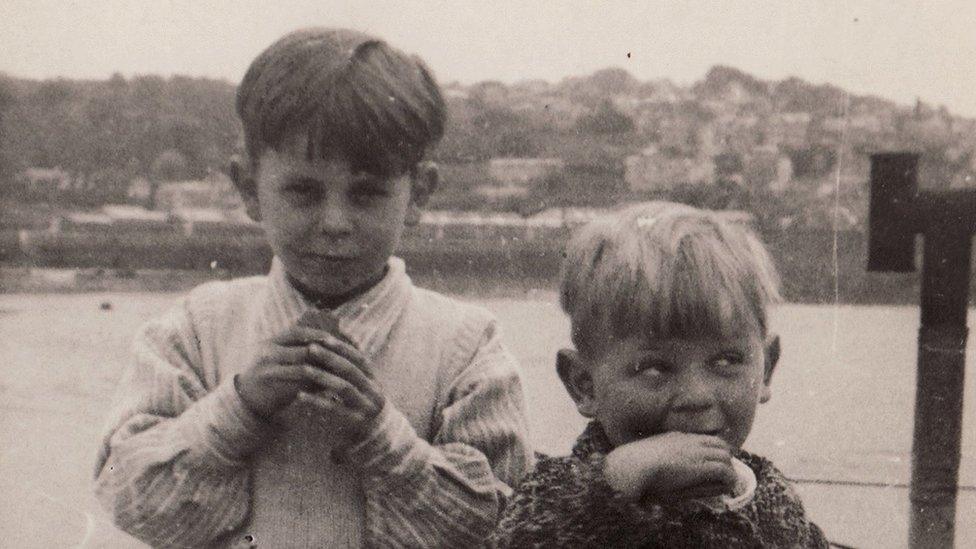 Peter Bott as a young boy with a friend