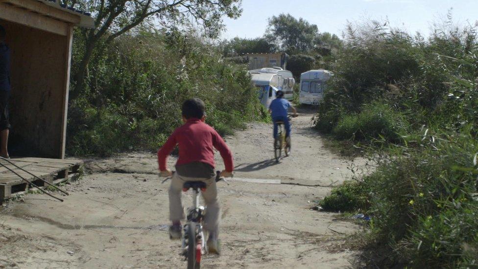 Children ride bikes in the Jungle