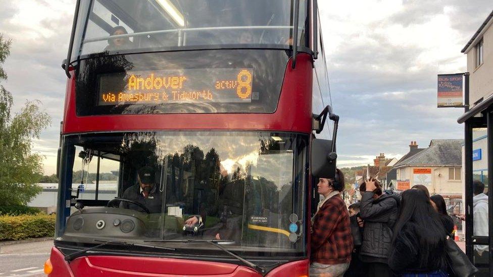 An overcrowded bus arrives in Tidworth