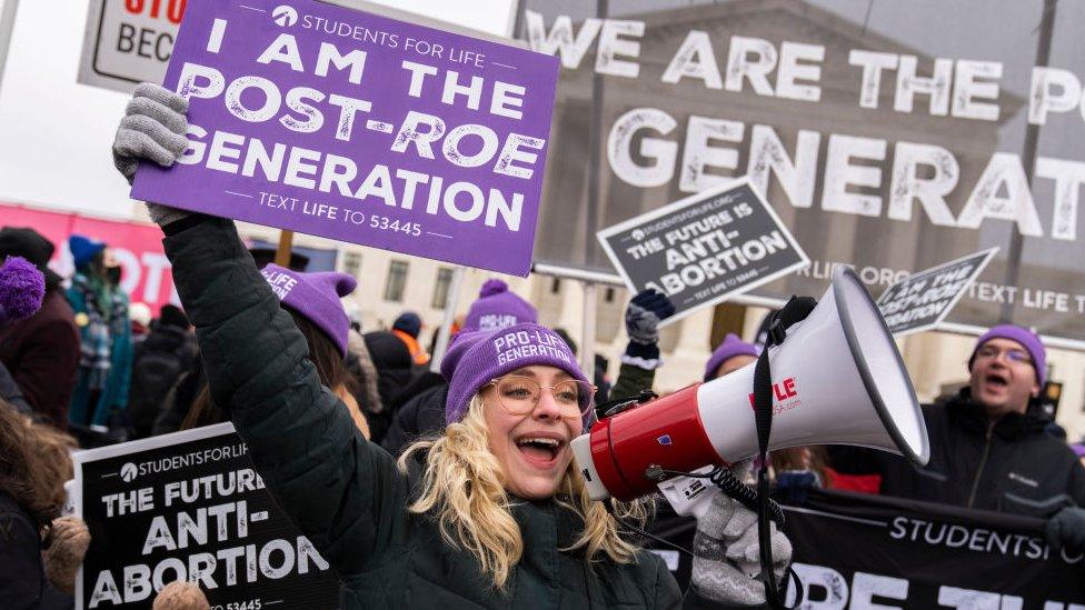 Demonstrators walk on First Street during the annual 49th March for Life anti-abortion demonstration on Capitol Hill