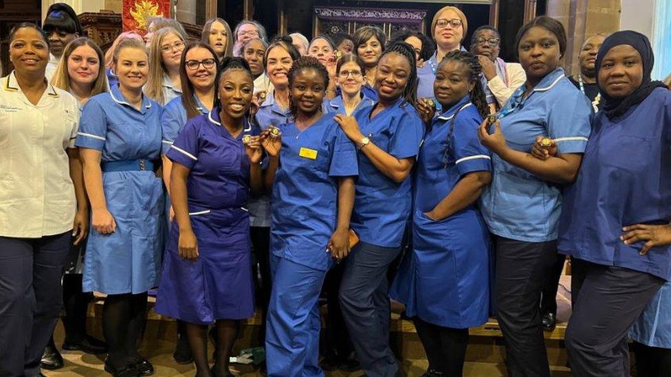 A group of student nurses at an award ceremony