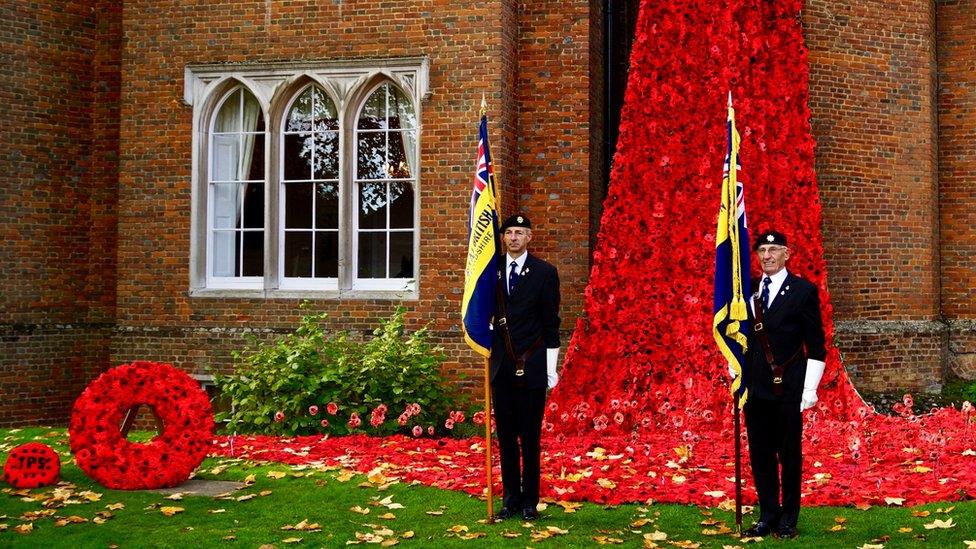 Royal British Legion standard bearers at Hertford Castle poppy display