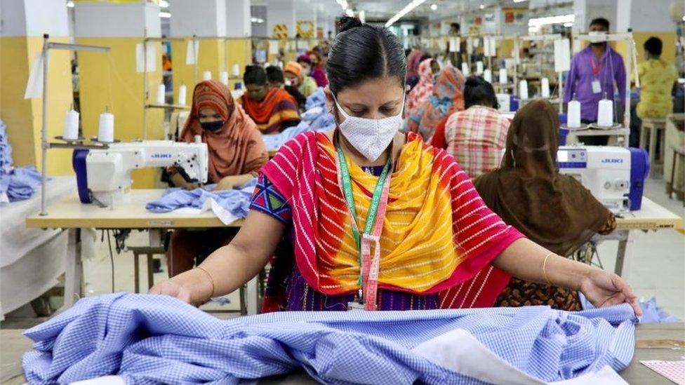 A woman works in a garment factory in Dhaka, Bangladesh (file photo)