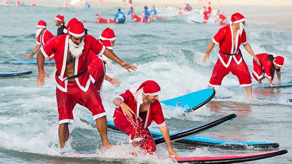 Surfing Santas