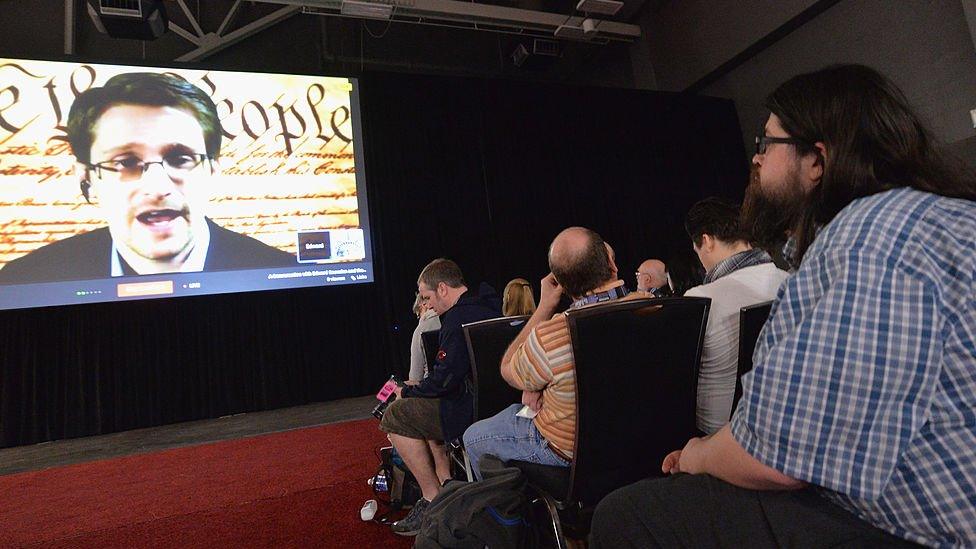 NSA whistleblower Edward Snowden speaks via videoconference at the 'Virtual Conversation With Edward Snowden' during the 2014 SXSW Music, Film + Interactive Festival at the Austin Convention Center on March 10, 2014 in Austin, Texas.