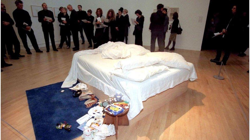 A photo of the bed on display at the Tate Modern.