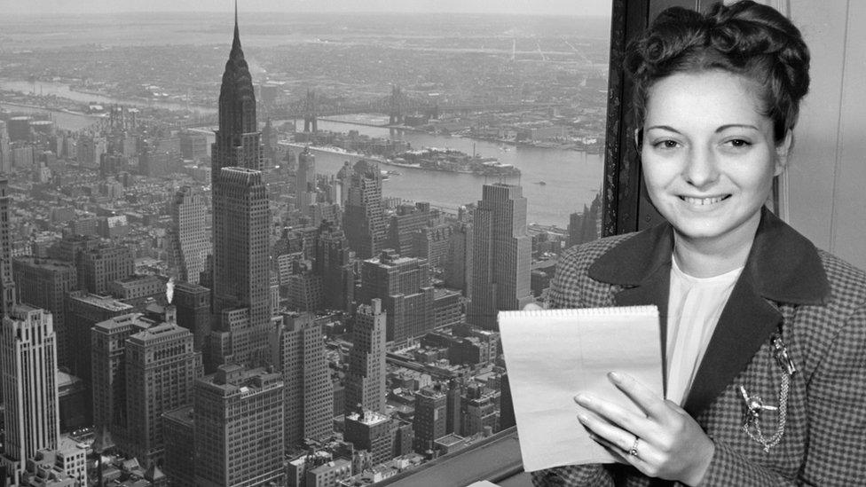 Woman with shorthand notepad