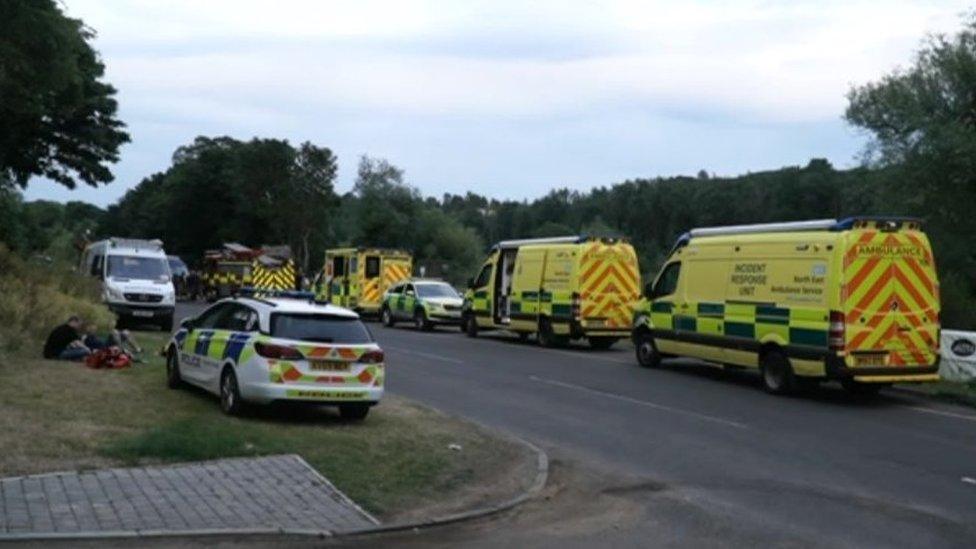 Police, fire and ambulance vehicles at the scene