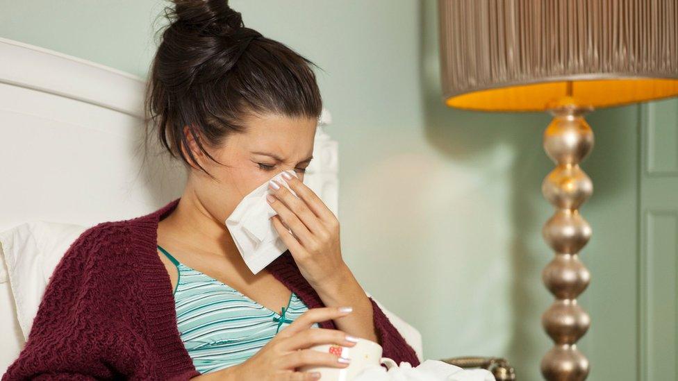 Stock image of woman with a cold