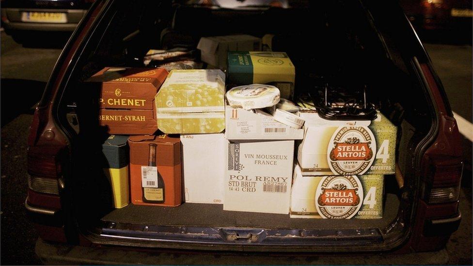 Car boot filled with wine, beer and cheese waits at the Calais ferry port