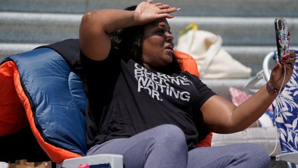 House Democrat Cori Bush seats in a chair on the steps of the US Capitol in Washington DC. Photo: 31 July 2021