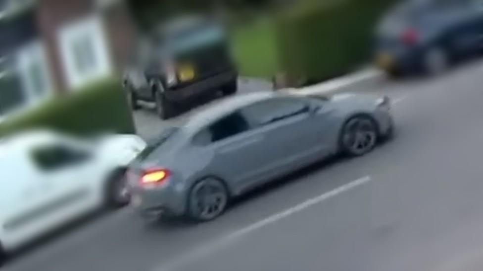 CCTV of a grey Hyundai i30 N