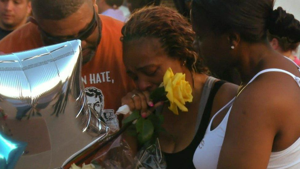 Families and friends of Dallas police officers mourn their loss.