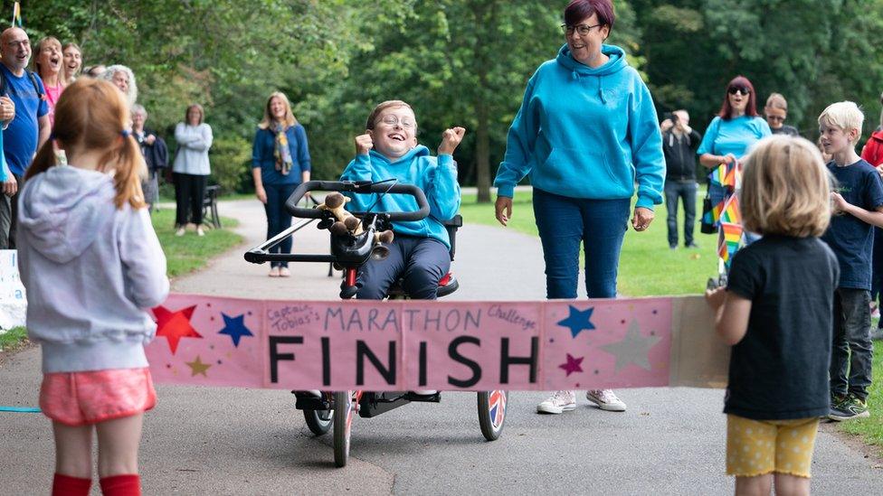 Tobias Weller crossing the finishing line